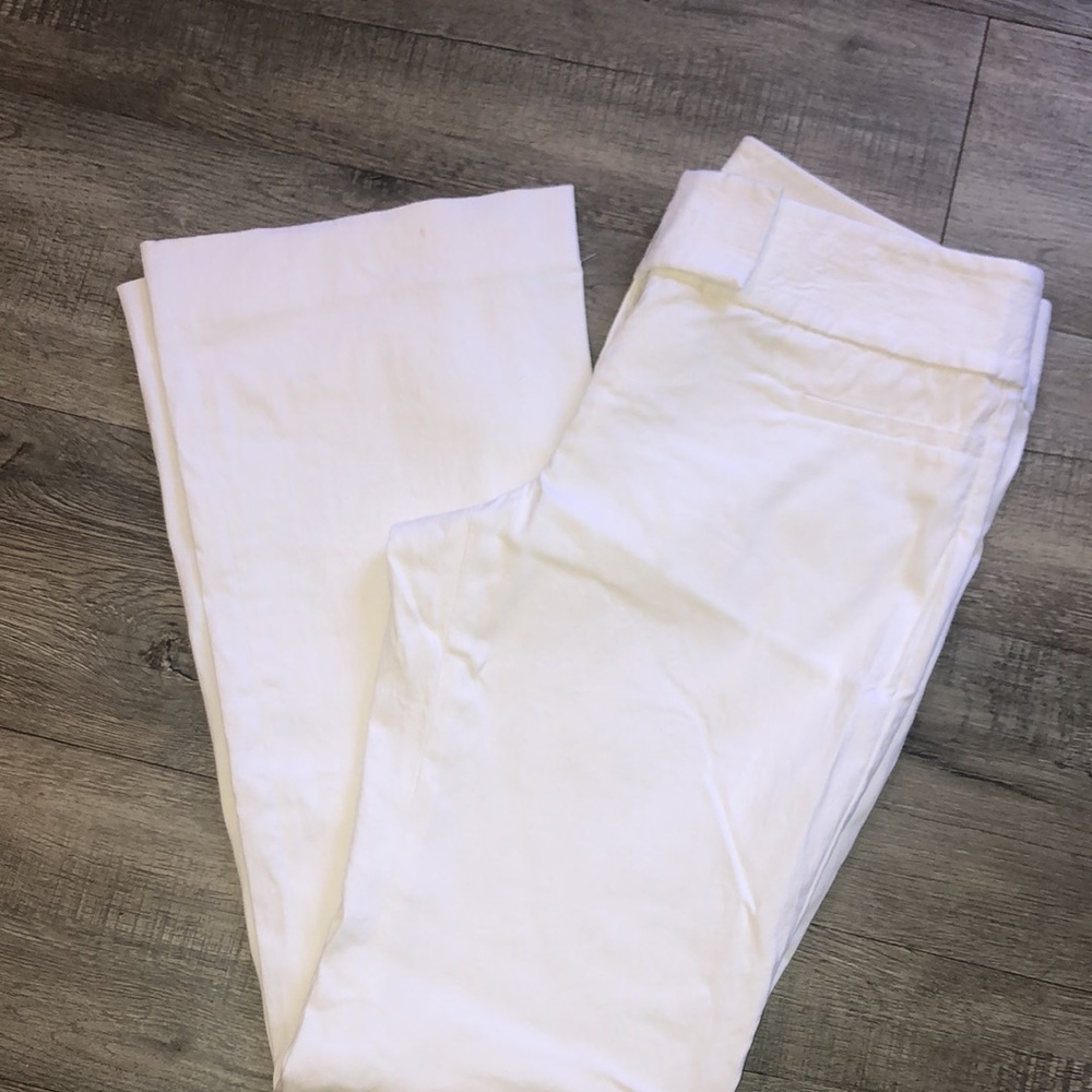 The limited all white stretchy pants wide leg on the bottom